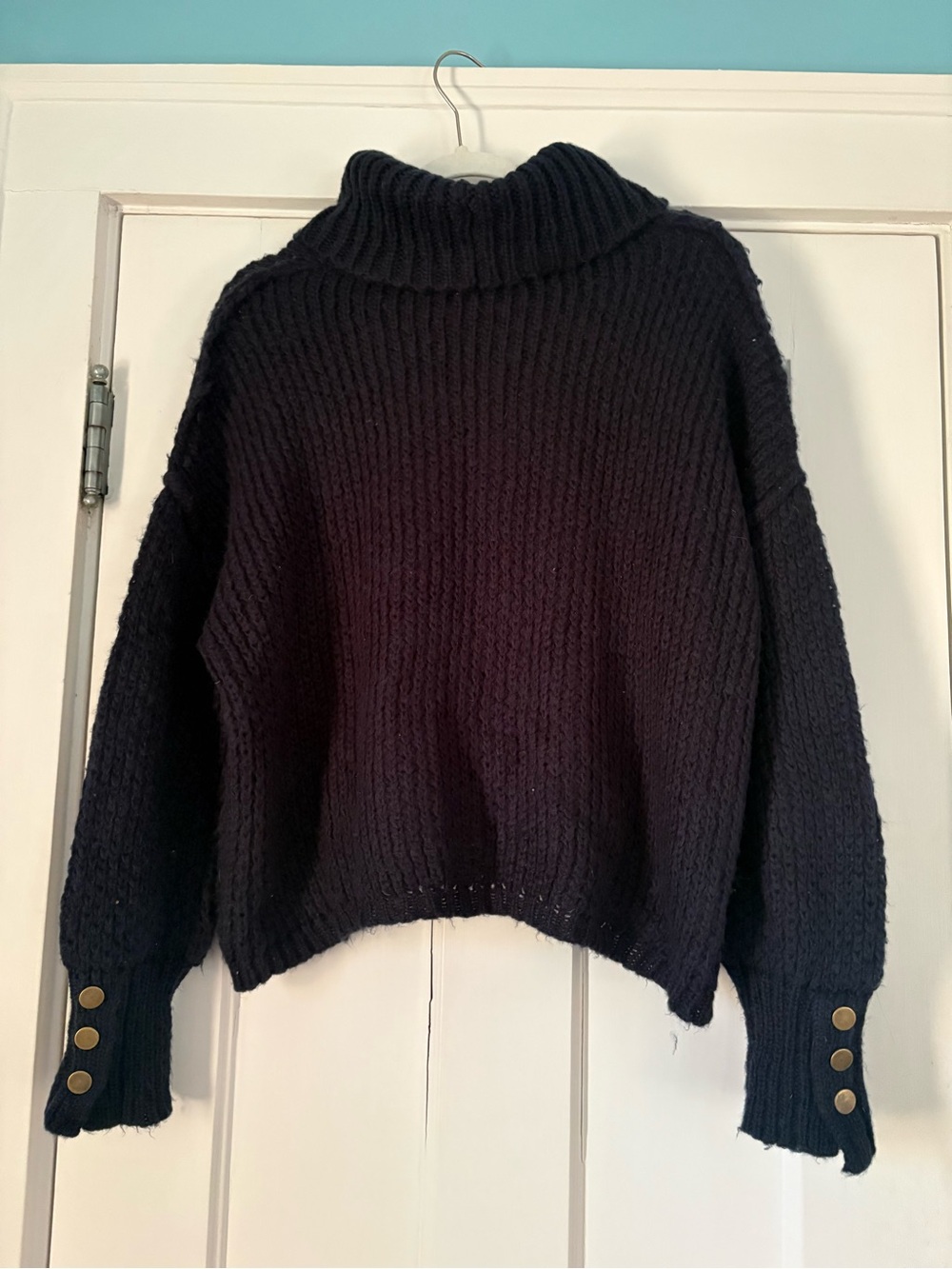 Chunky Black Turtleneck Sweater with Button Cuff